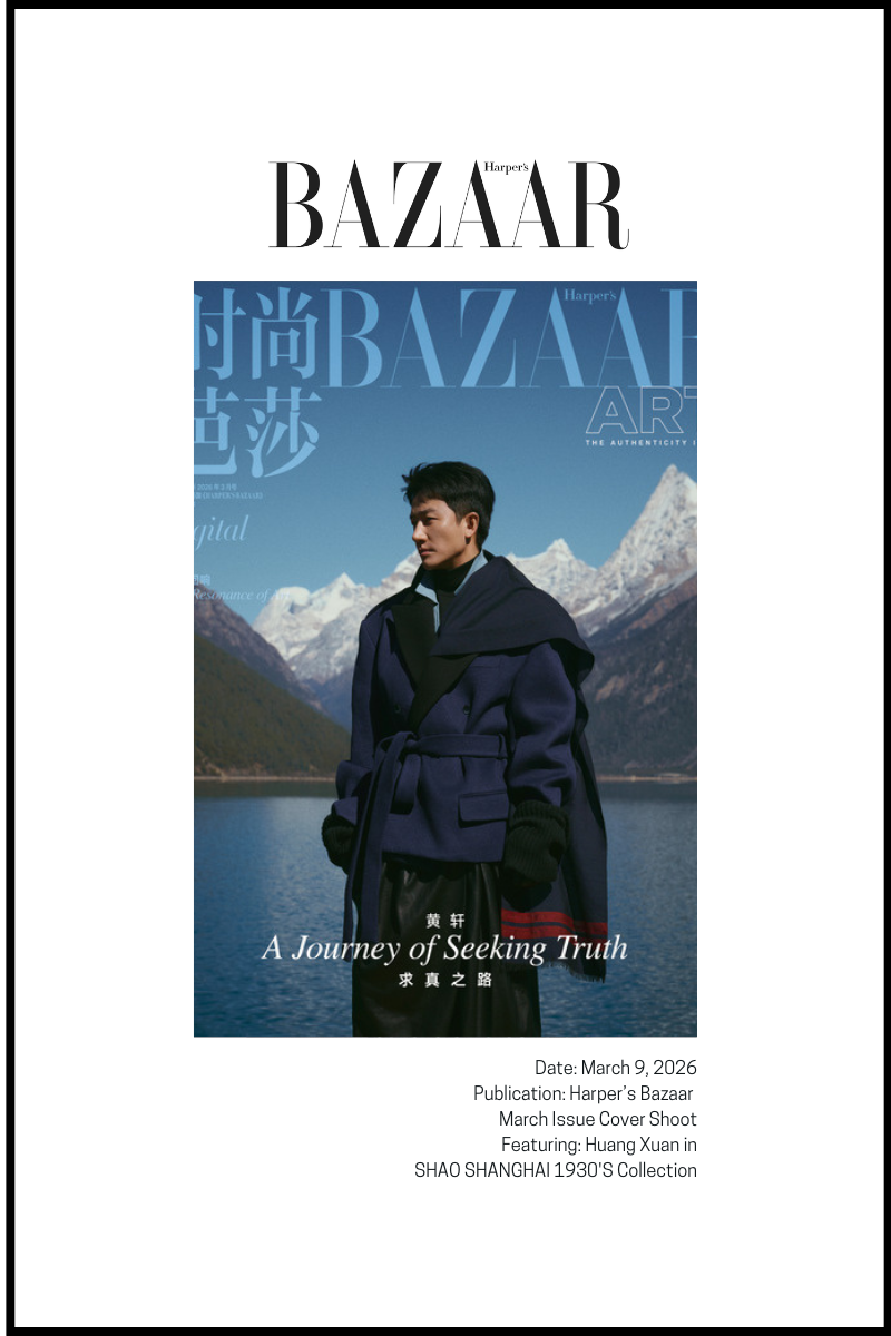 man in blue coat on Harper's Bazaar