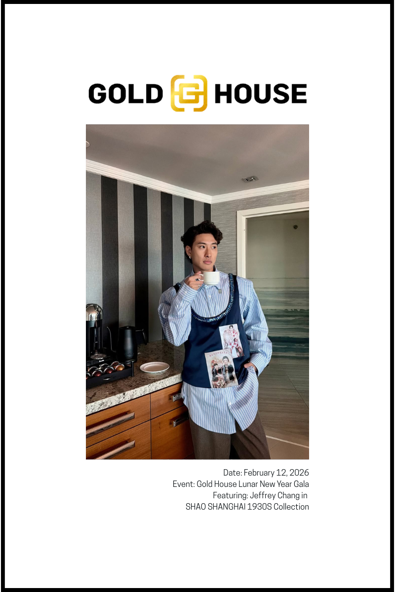 man in sapphire vest