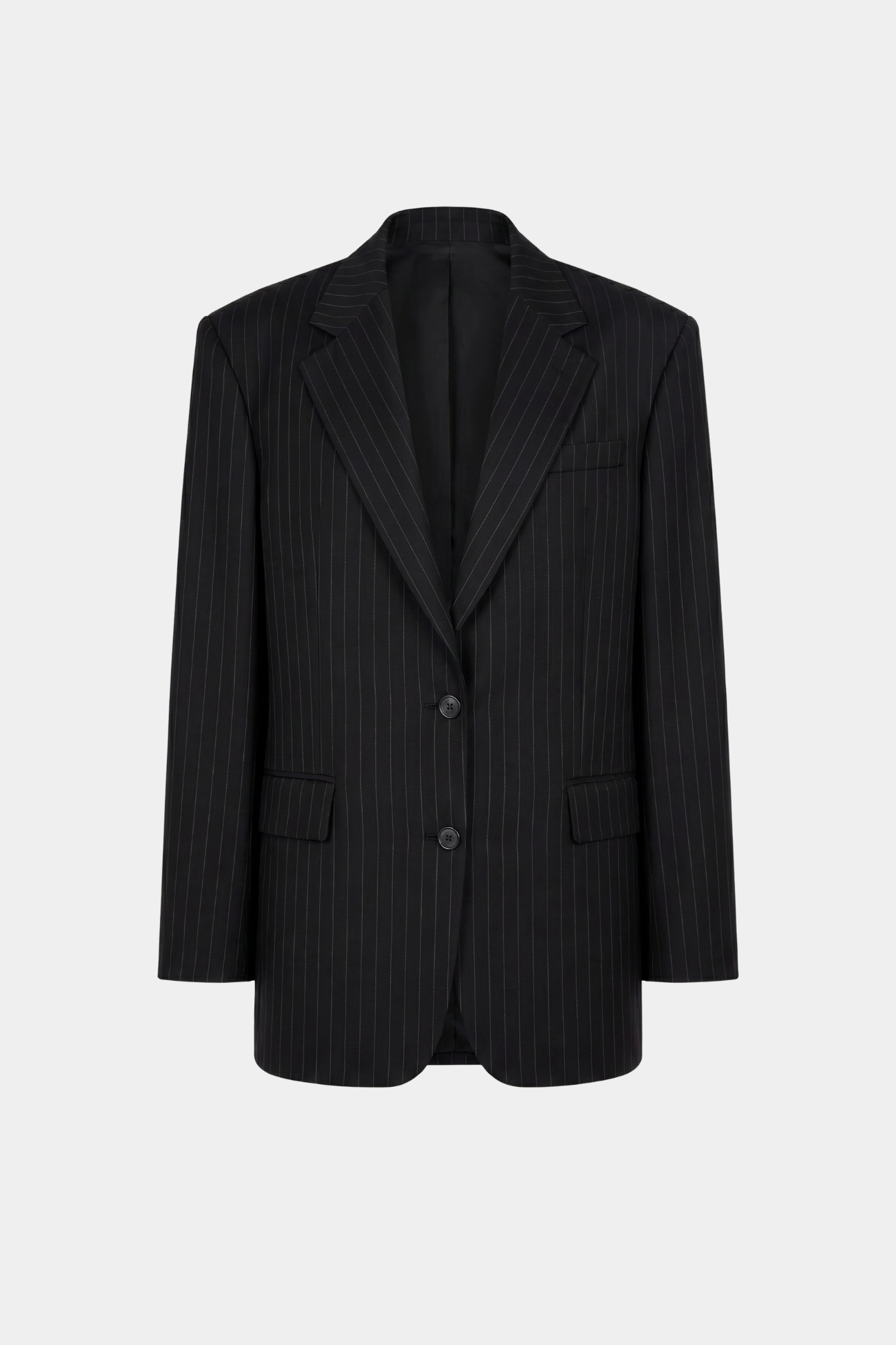 Black Pinstripe Boxy Oversized Jacket with a relaxed sculptural silhouette, featuring fine vertical pinstripes, notched lapels, and a two-button front, showcasing SHAO New York bespoke tailoring.
