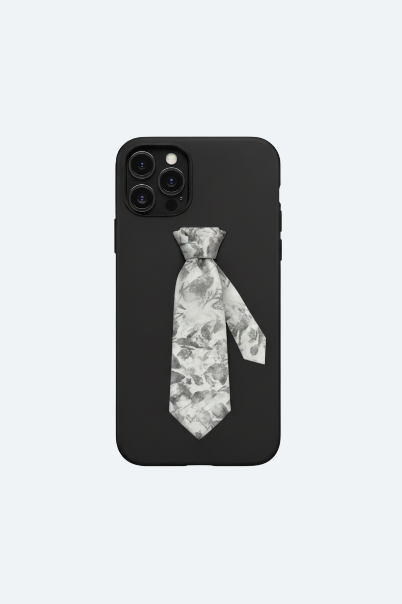 Floral Tie Phone Case Limited Edition featuring a sculptural monochrome floral tie detail on a sleek black matte base, embodying luxury designer fashion and New York bespoke tailoring.