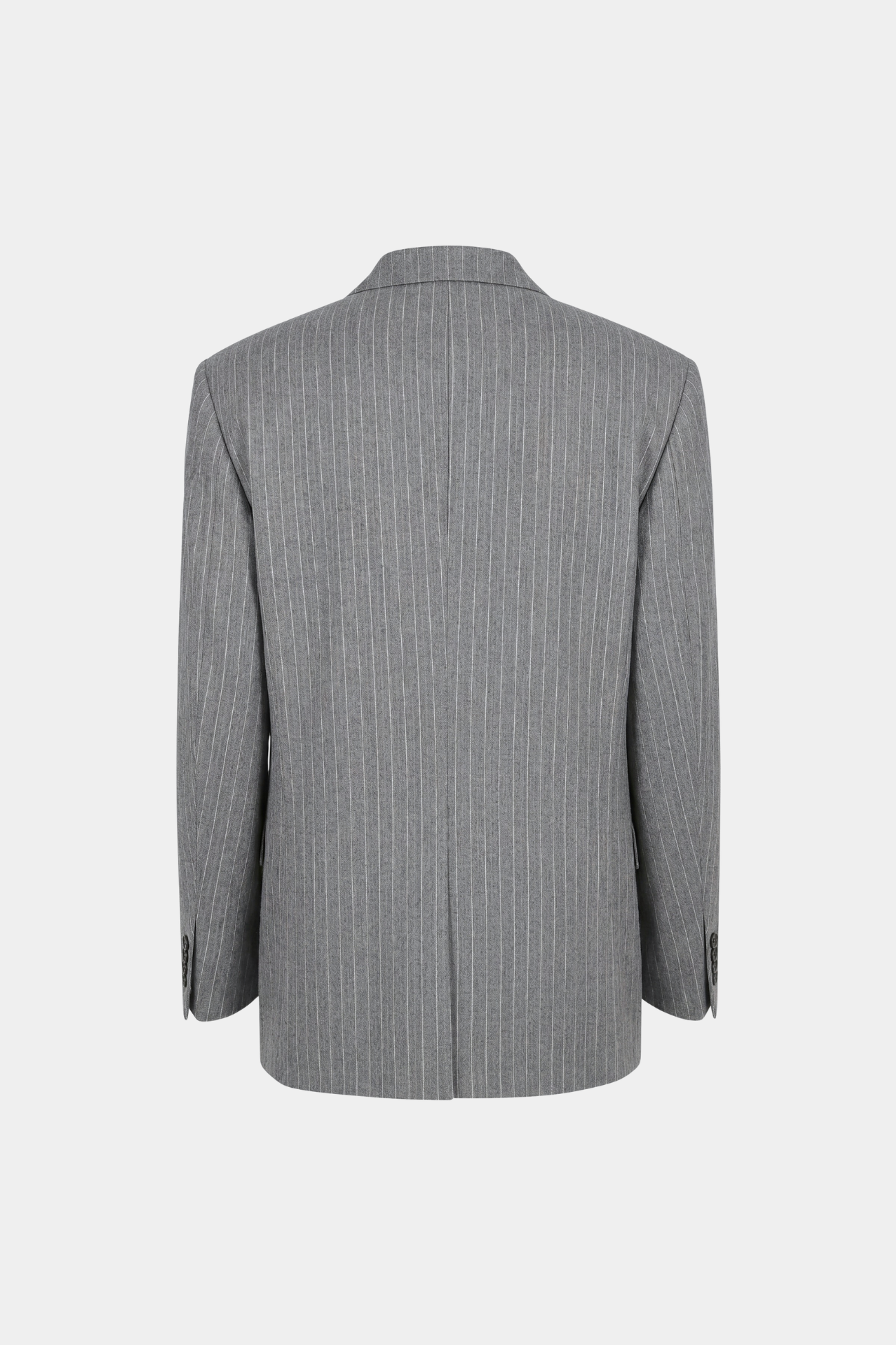 Back view of the Grey Pinstripe Boxy Double Breasted Blazer revealing a clean, structured silhouette with fine vertical pinstripes and tailored details from SHAO New York bespoke tailoring.