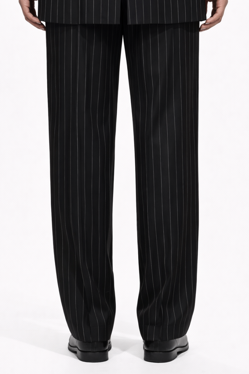 Black Pinstripe Wide-Leg Trousers in a relaxed tailored fit featuring fine vertical pinstripes, crafted with precision for a luxury designer fashion look with a sculptural silhouette.