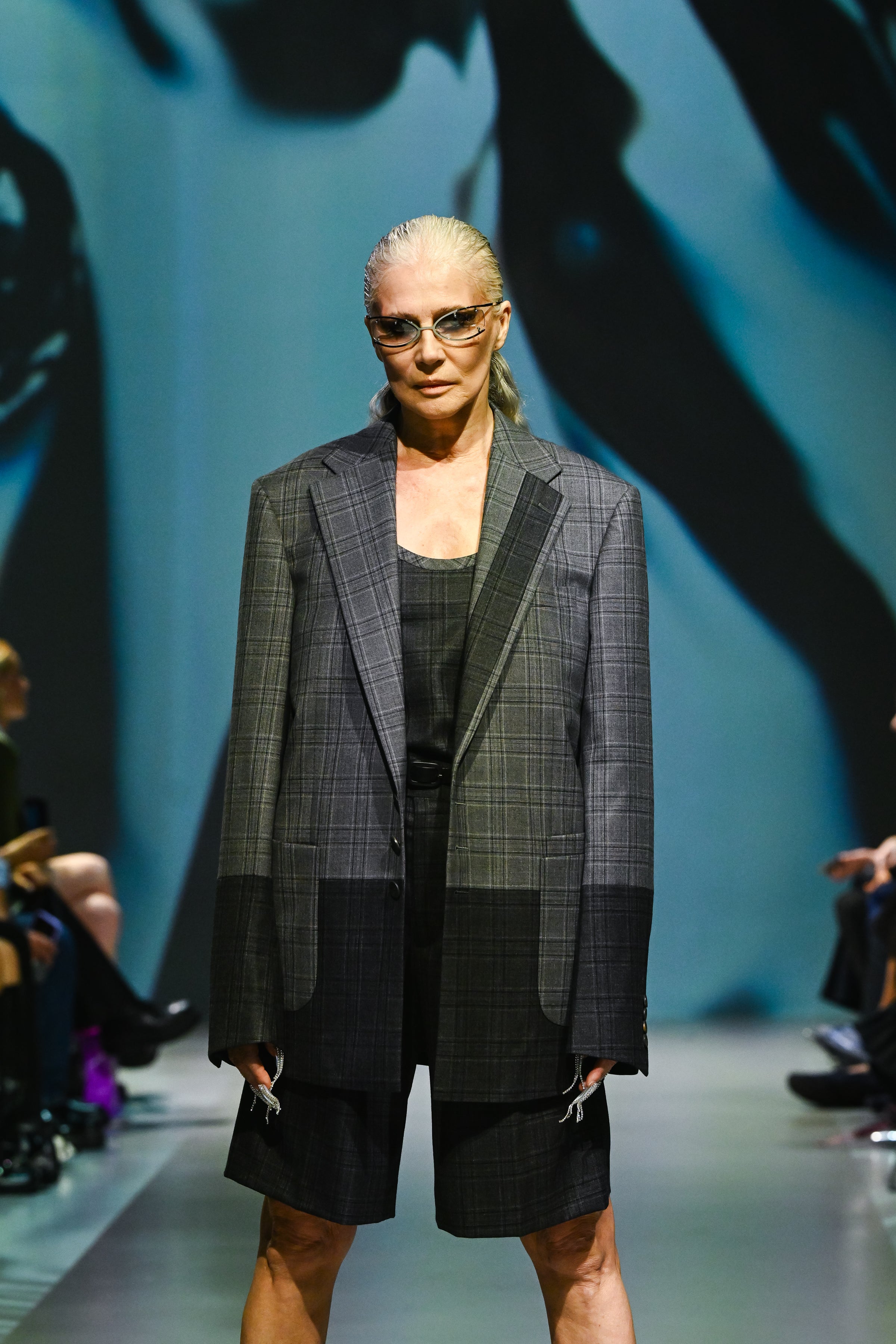 Model showcasing the Color Block Plaid Wool Blazer with a distinctive patchwork of plaid patterns, structured shoulders, and an oversized fit in SHAO New York bespoke tailoring.