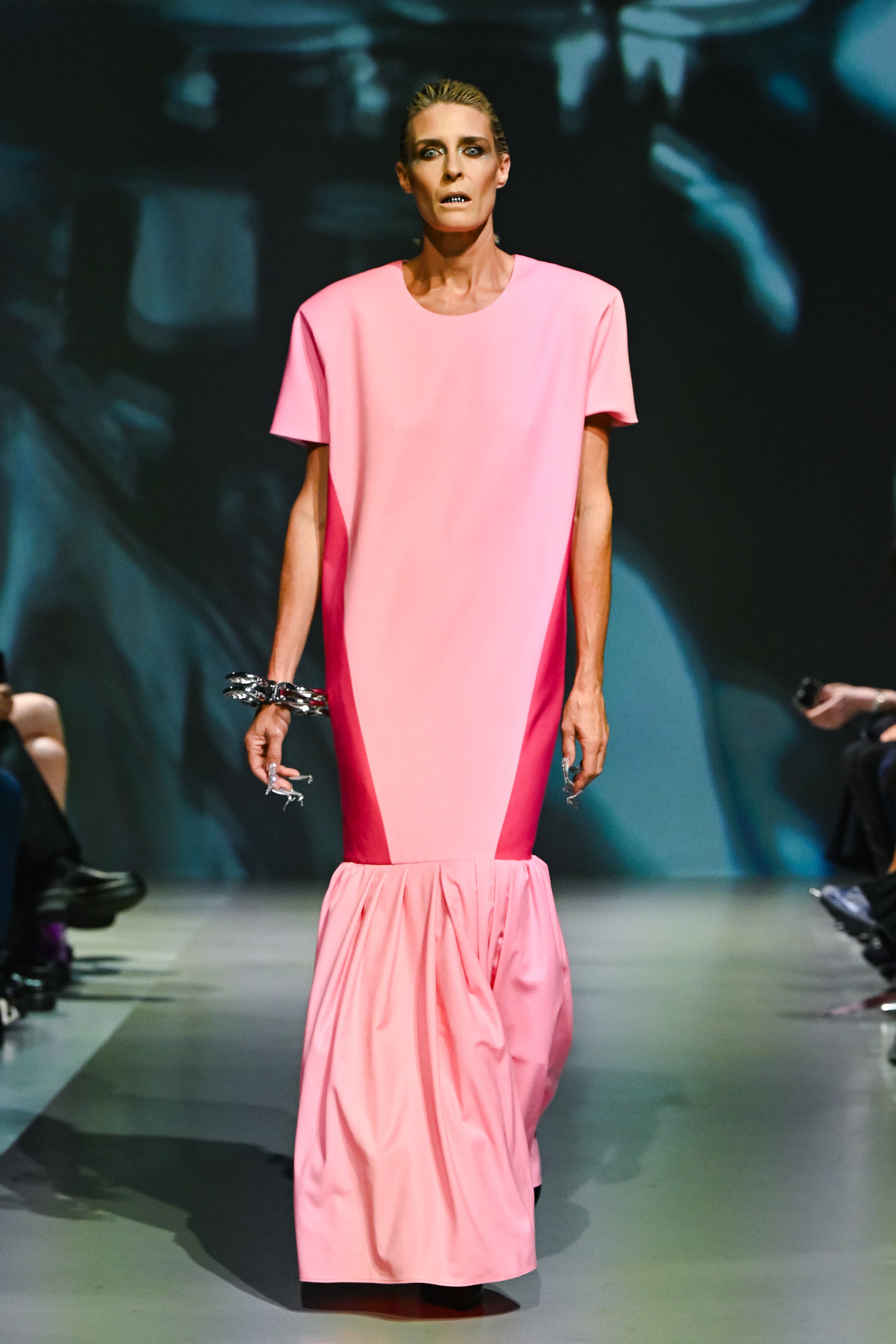 Runway model showcasing a Pink Color-Block Straight Dress featuring a structured silhouette with bold side panels and a gathered hem, exemplifying SHAO New York luxury designer fashion.