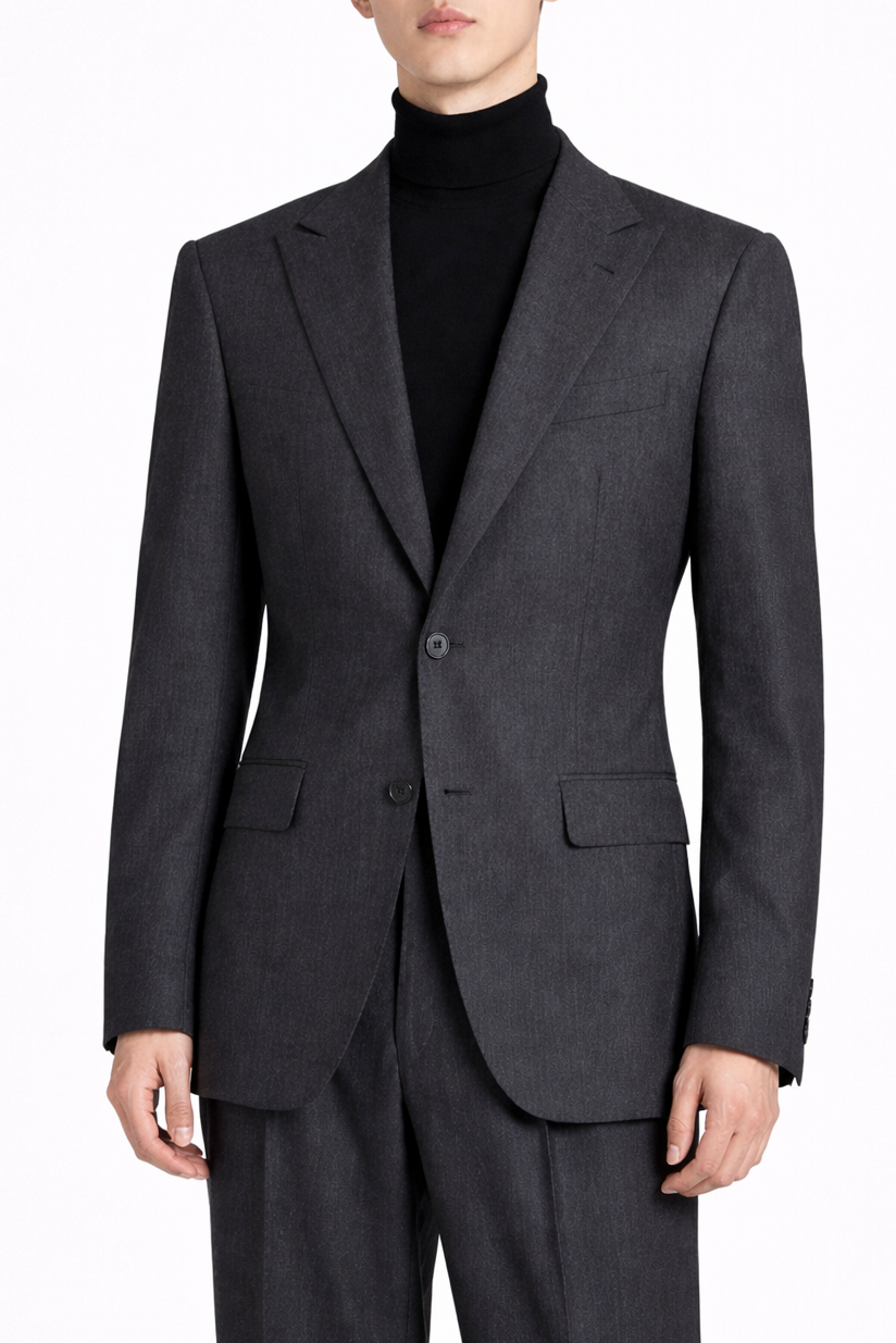 Front view of the Charcoal Grey Relaxed Fit Jacket with a two-button closure, notch lapels, and tailored welt pockets, styled over a black turtleneck, highlighting SHAO New York bespoke tailoring and a refined sculptural silhouette.