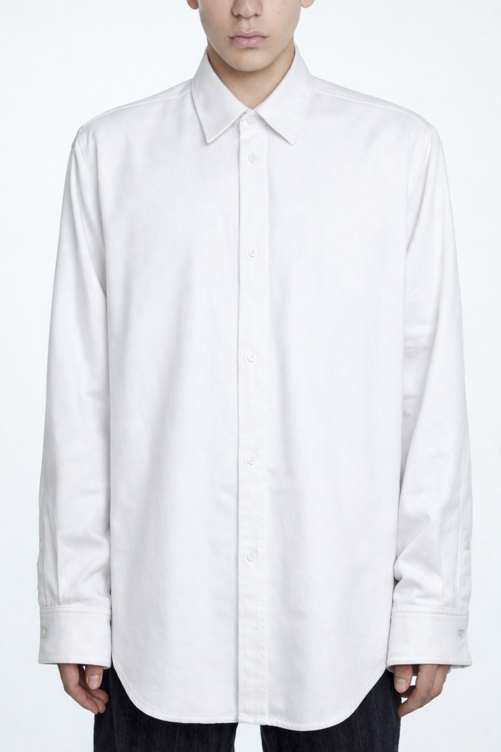 White Twill Power Shirt – Structured Shoulder Construction in crisp white featuring clean lines and tailored fit, highlighting luxury designer fashion and New York bespoke tailoring.