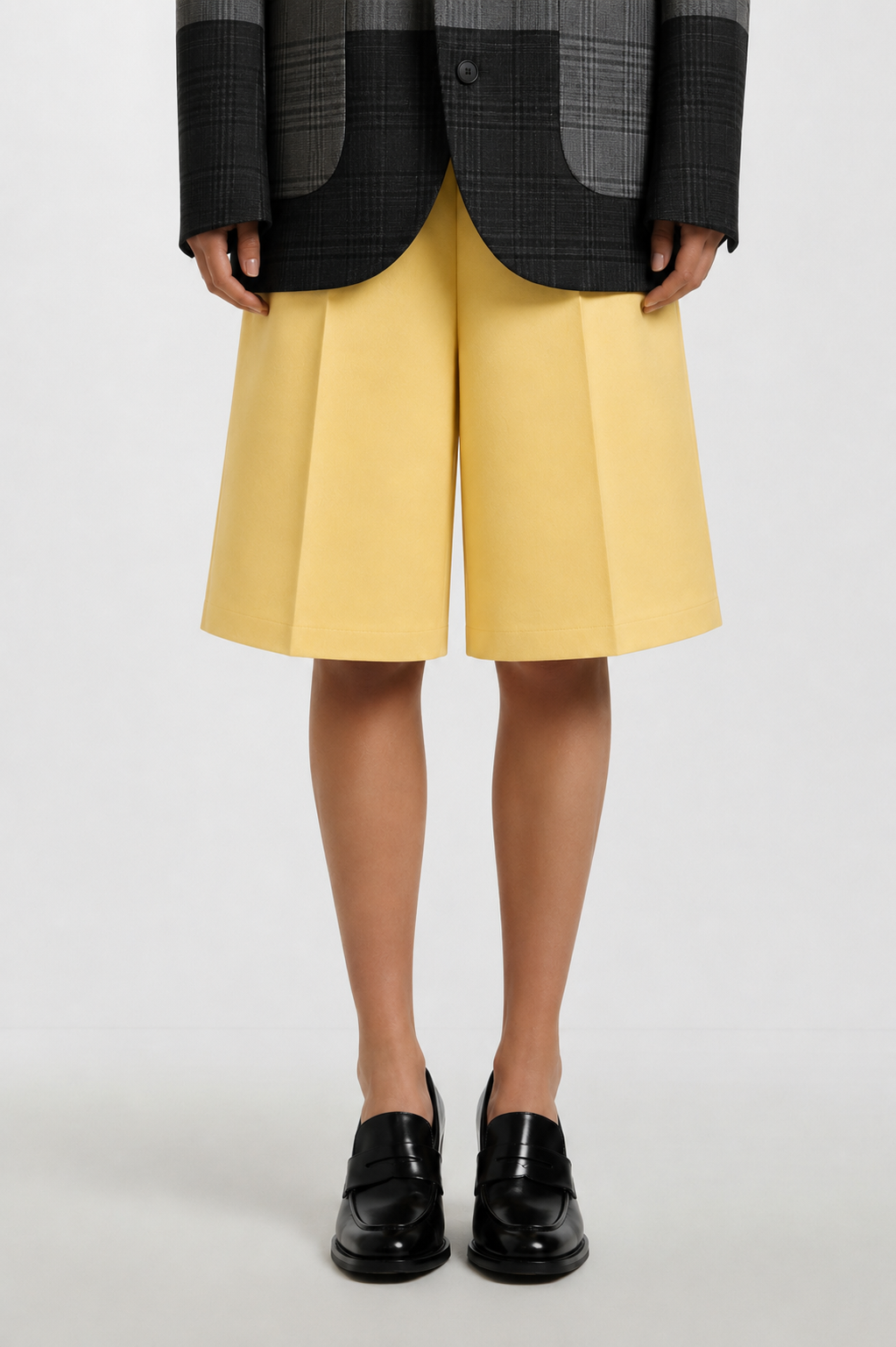 SHAO pastel yellow Bermuda shorts with wide leg silhouette