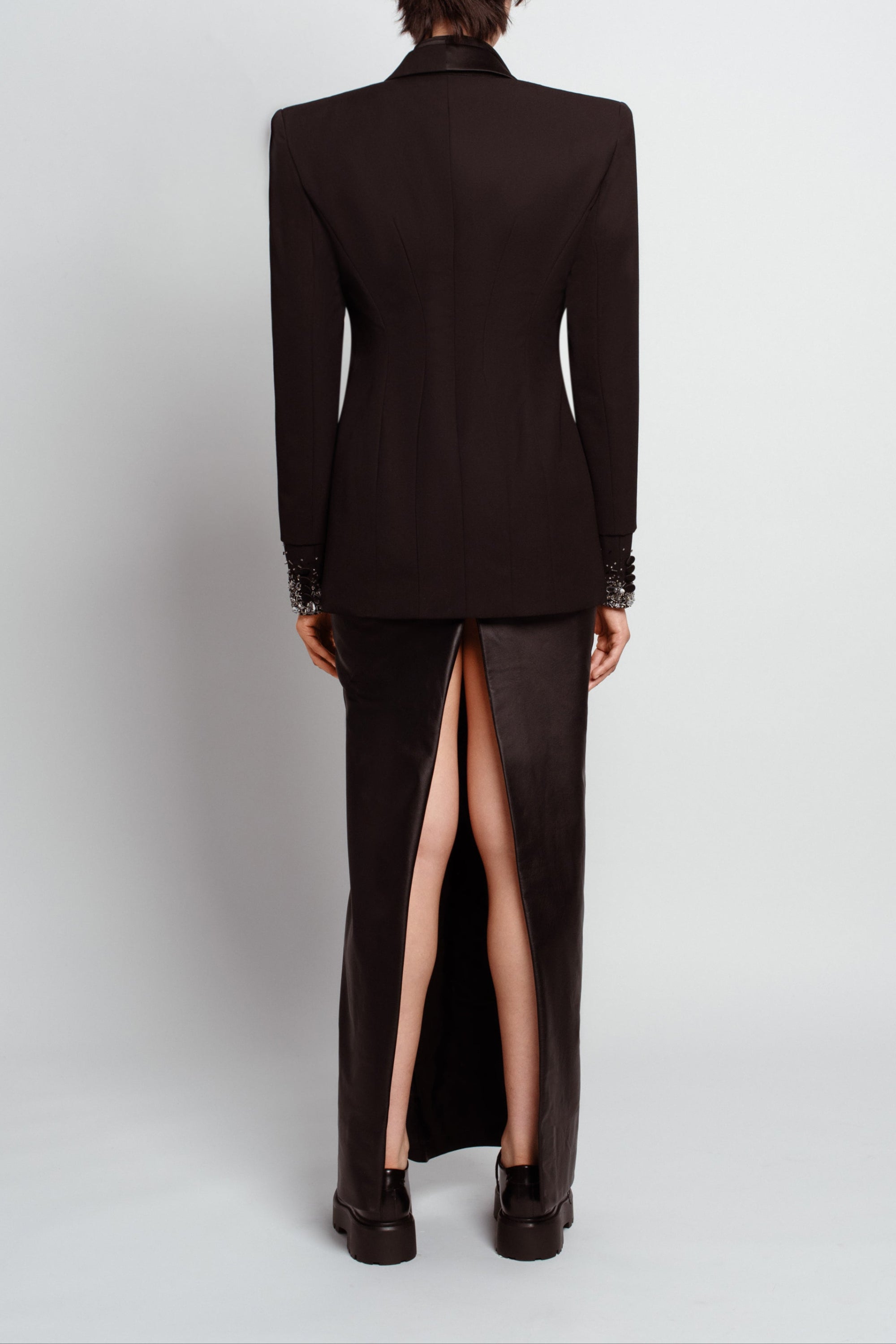 Black leather column skirt back view