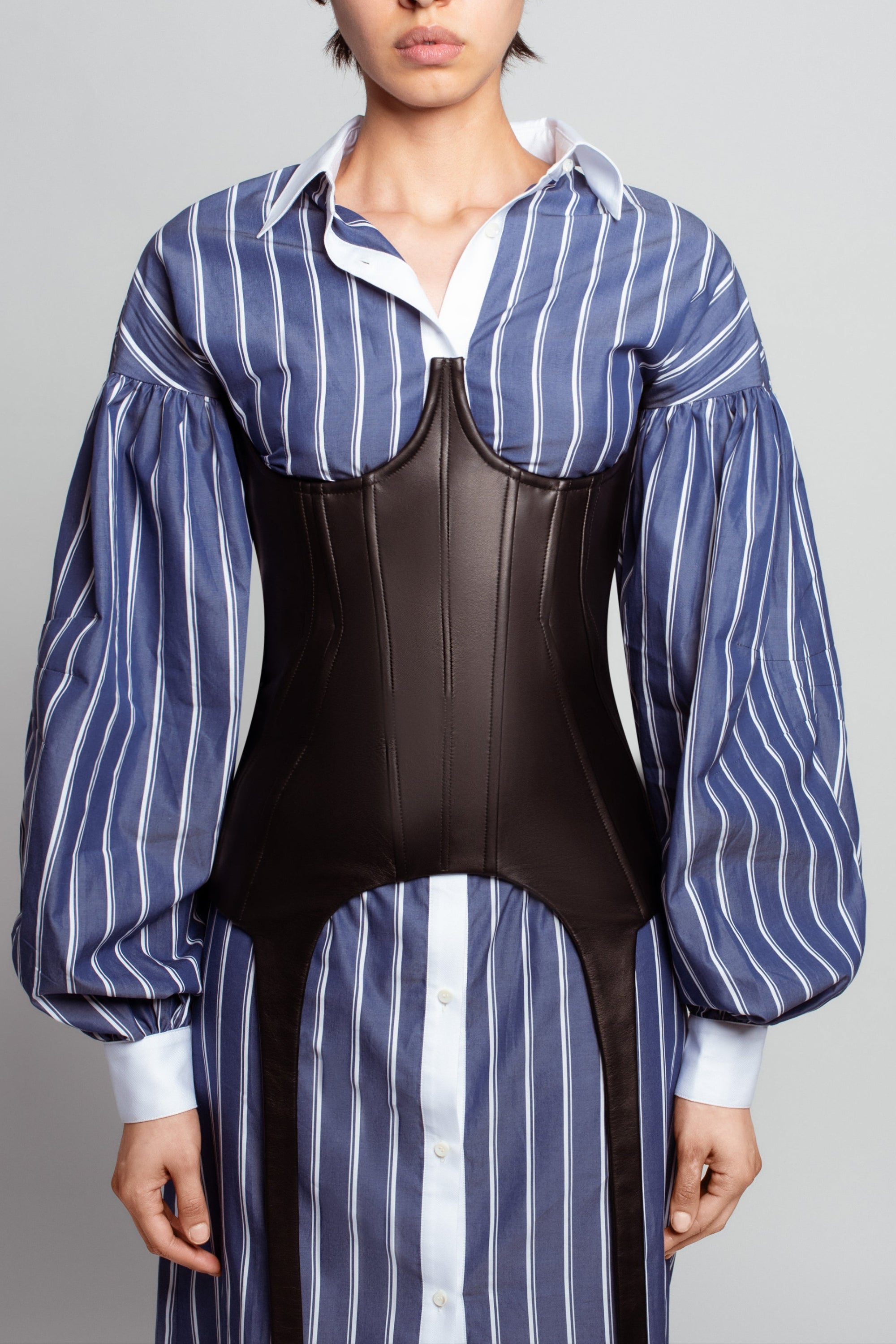 Black leather corset sculptural structure front view