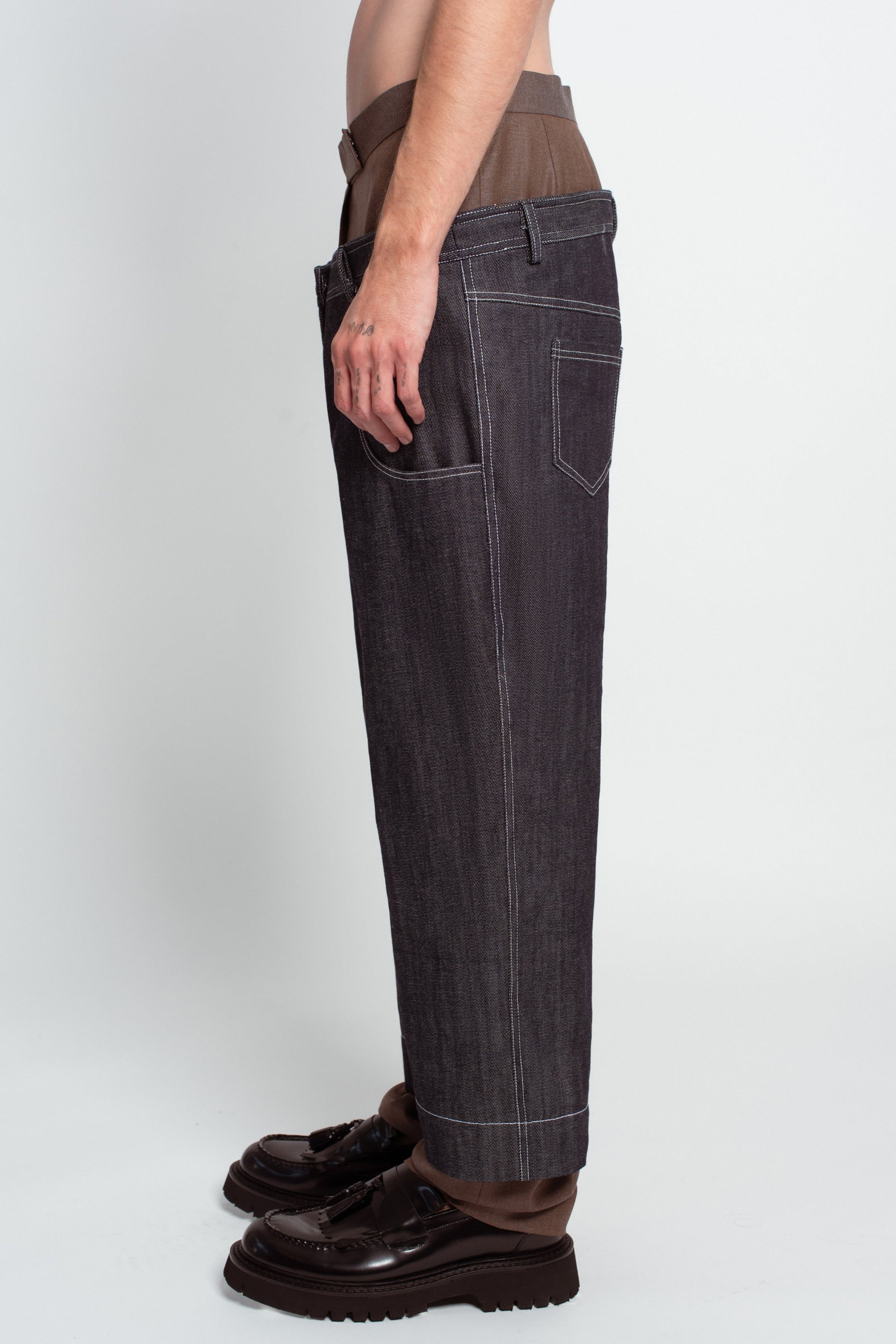 Blue denim layered trousers structured side view