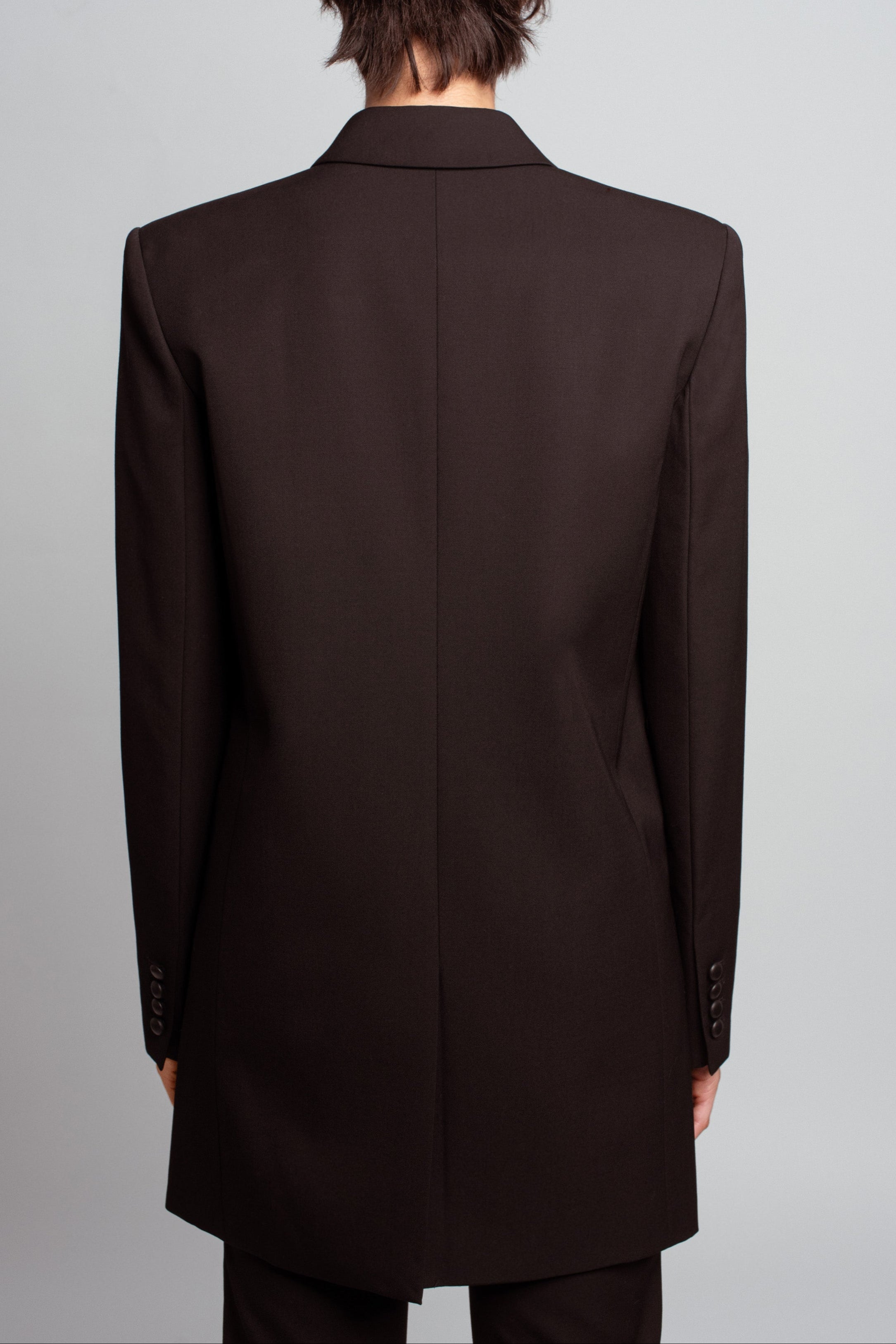 SHAO jet black wool long jacket with structured proportions angled back view