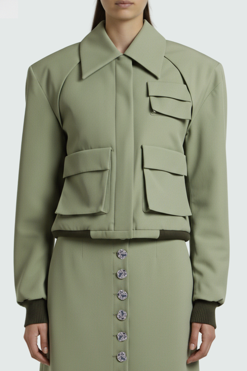 Sage green utility bomber jacket styled with tailored trousers
