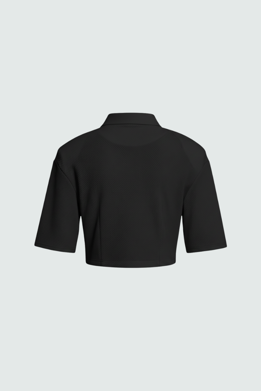 Black Textured Cropped Polo Top shown from the back, featuring a structured collar and short sleeves, crafted with breathable fabric highlighting luxury SHAO New York bespoke tailoring.