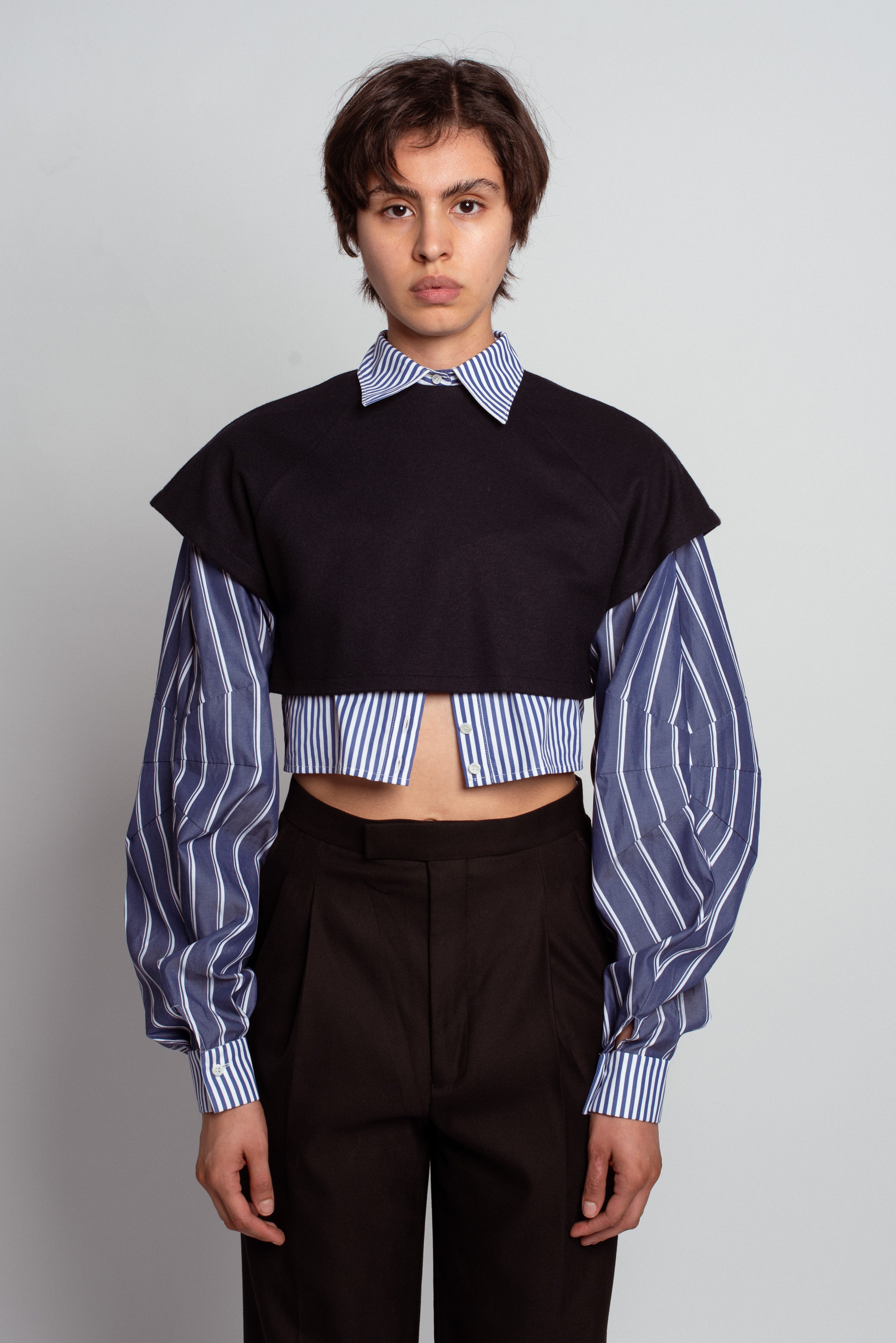 Layered Cropped Shirt Top with navy cropped overlay layered over a blue and white vertically striped shirt featuring voluminous sleeves and buttoned cuffs, reflecting SHAO New York luxury designer fashion and a sculptural silhouette.