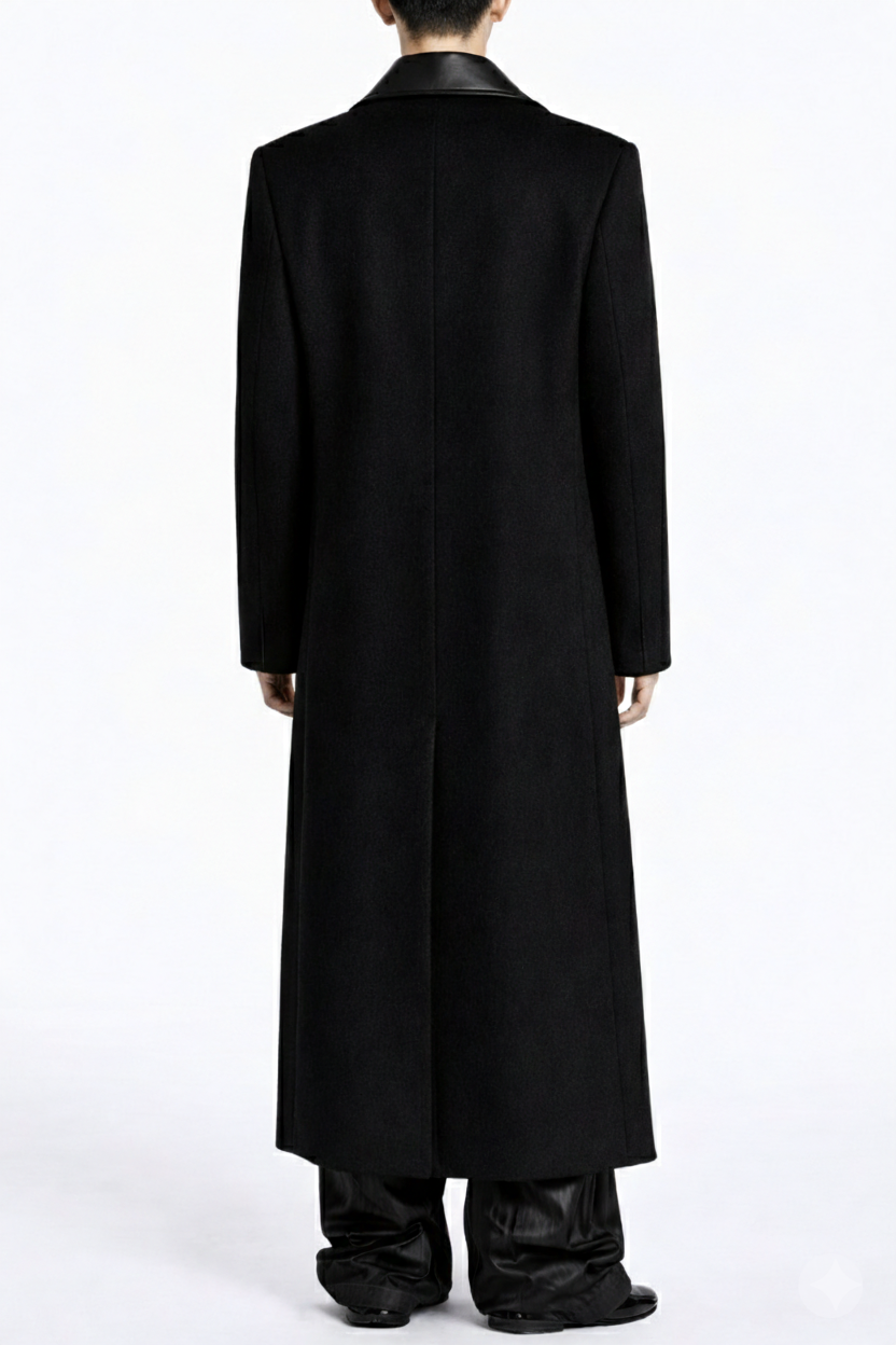Back view of the Oversized Black Cashmere Overcoat With Leather Accents featuring a long sculptural silhouette and tailored clean lines, reflecting SHAO New York bespoke tailoring.