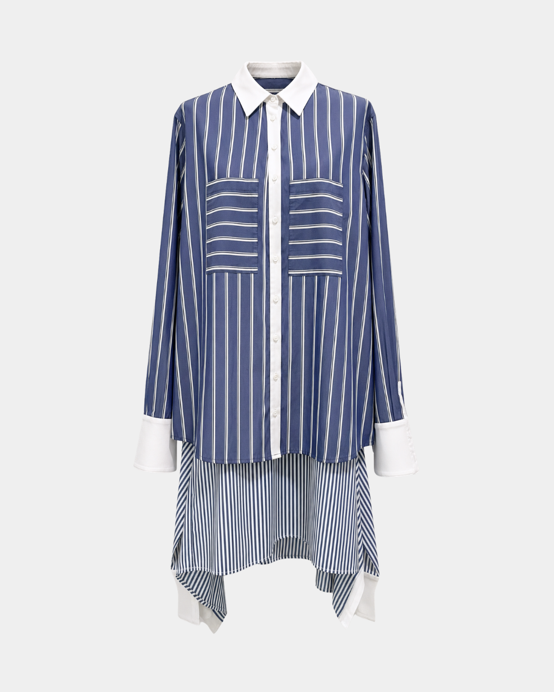 Blue Pinstripe Layered Shirt – Attached Back Construction featuring bold vertical stripes in varying widths, contrast white collar and cuffs, and a sculptural layered hem, embodying SHAO New York bespoke tailoring and luxury designer fashion.