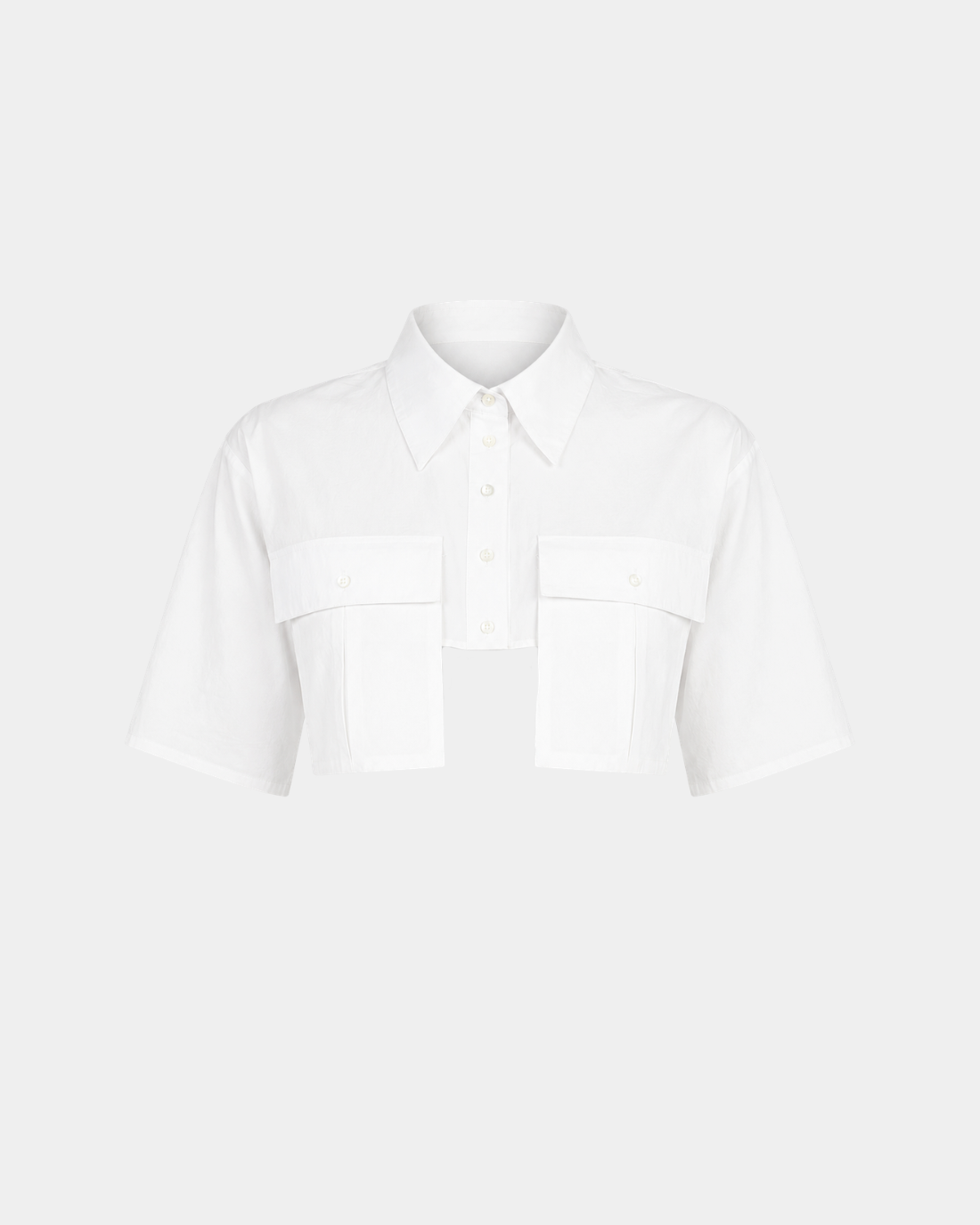 Front view of White Cropped Utility Shirt featuring a pointed collar, short sleeves, button front, and oversized flap pockets, showcasing SHAO New York bespoke tailoring and luxury designer fashion.