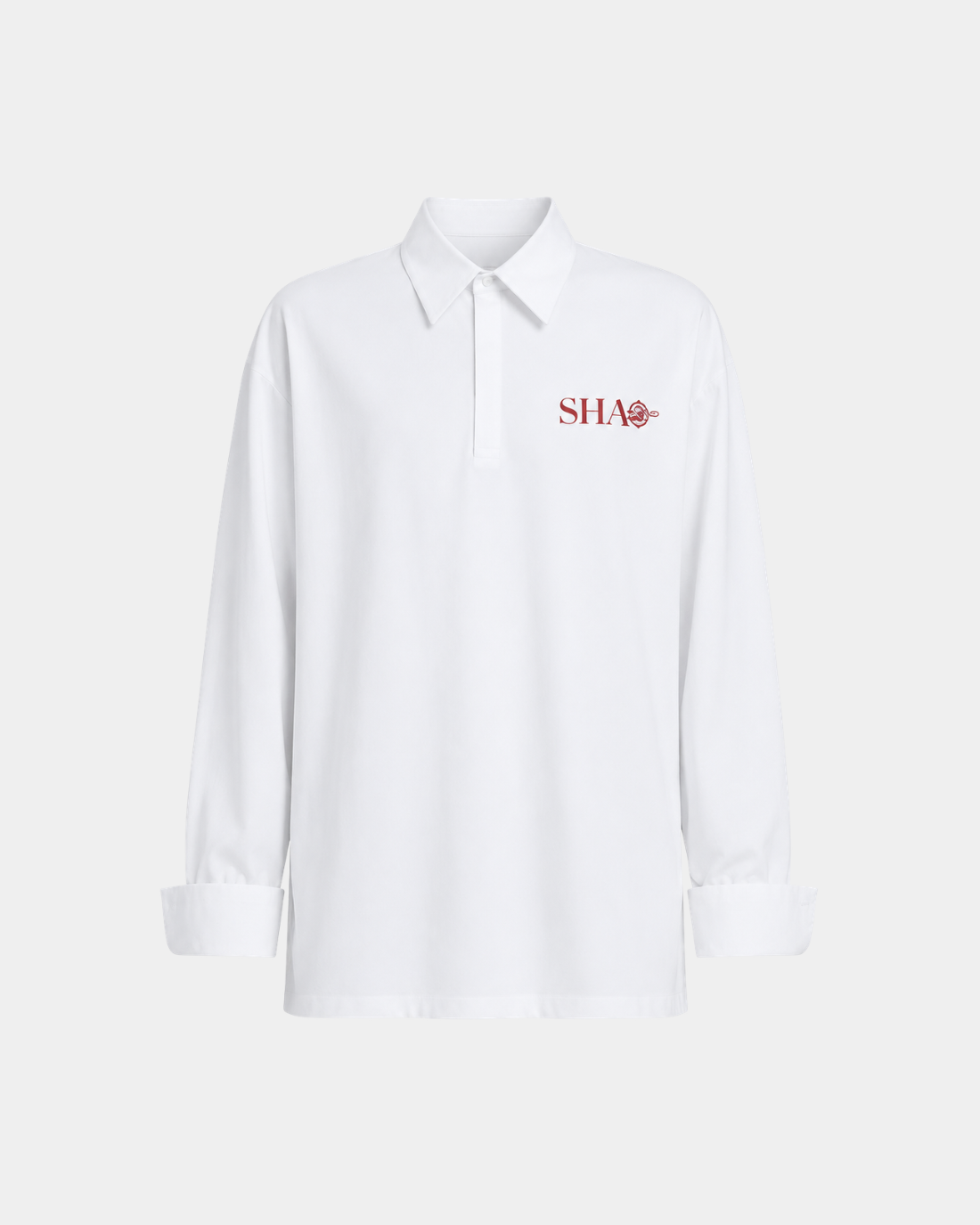 Year of the Horse SHAO Graphic Shirt in crisp white fabric featuring a sharp collar and minimalist red SHAO logo embroidered on the chest, blending luxury designer fashion with modern tailoring.