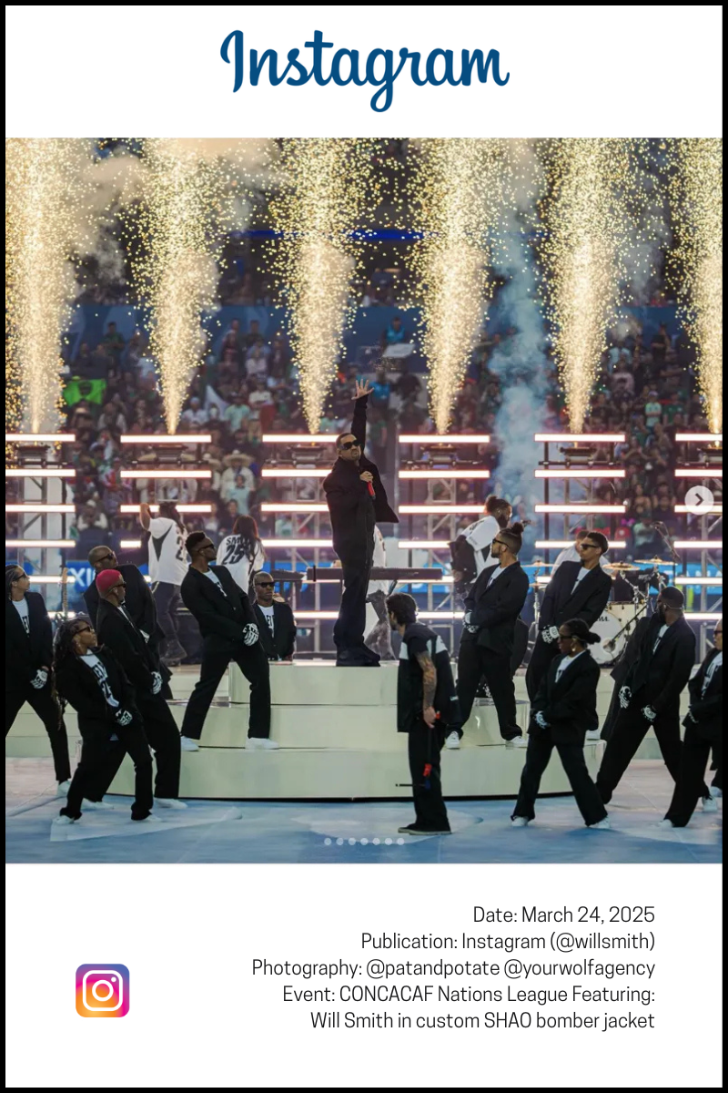 Will Smith conducting mariachi band while wearing custom SHAO bomber jacket at CONCACAF Nations League halftime show, with golden pyrotechnics creating dramatic backdrop