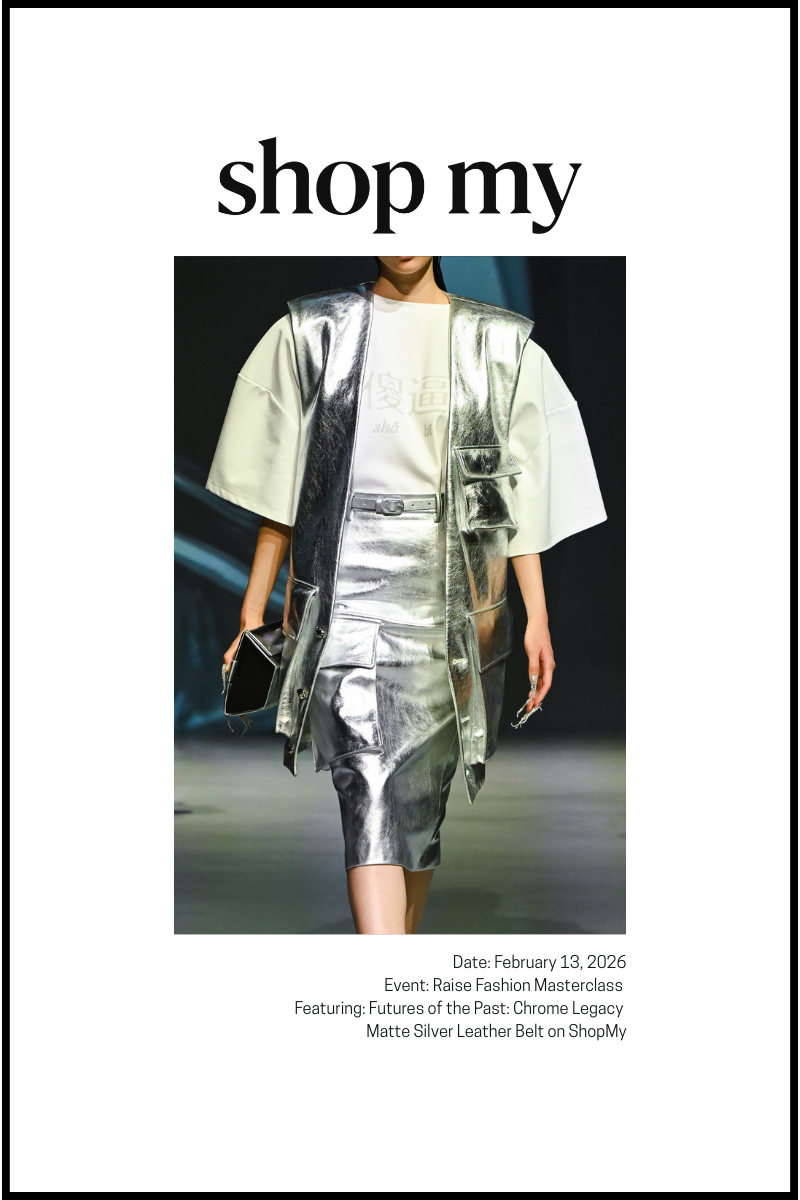 runway model in silver outfit