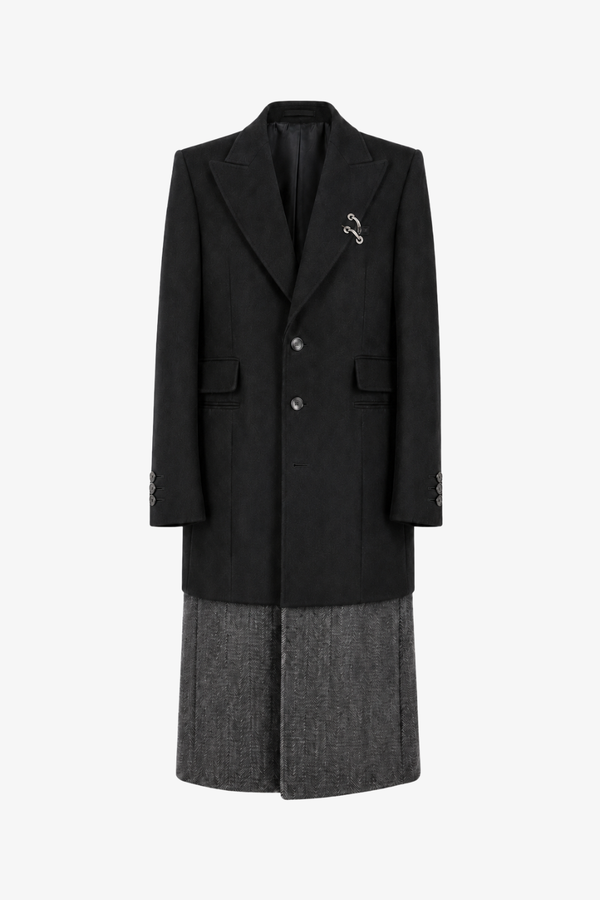 Cashmere Silk Double Layered Coat in black with structured lapels, tailored long sleeves, button closure, and a contrasting textured lower layer, exemplifying SHAO New York bespoke tailoring and luxury designer fashion.