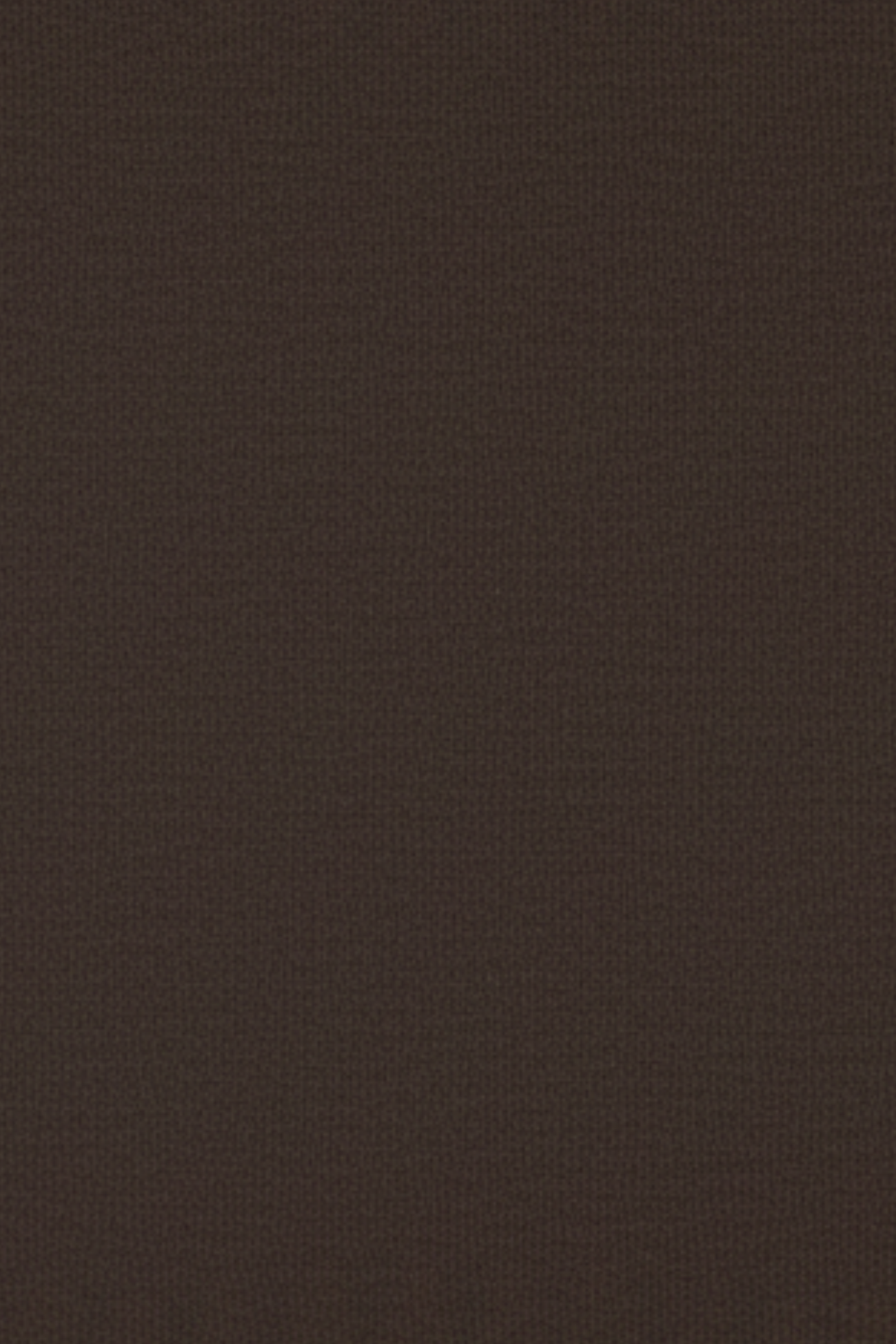 Close-up swatch of black denim and suiting fabric from hybrid trousers