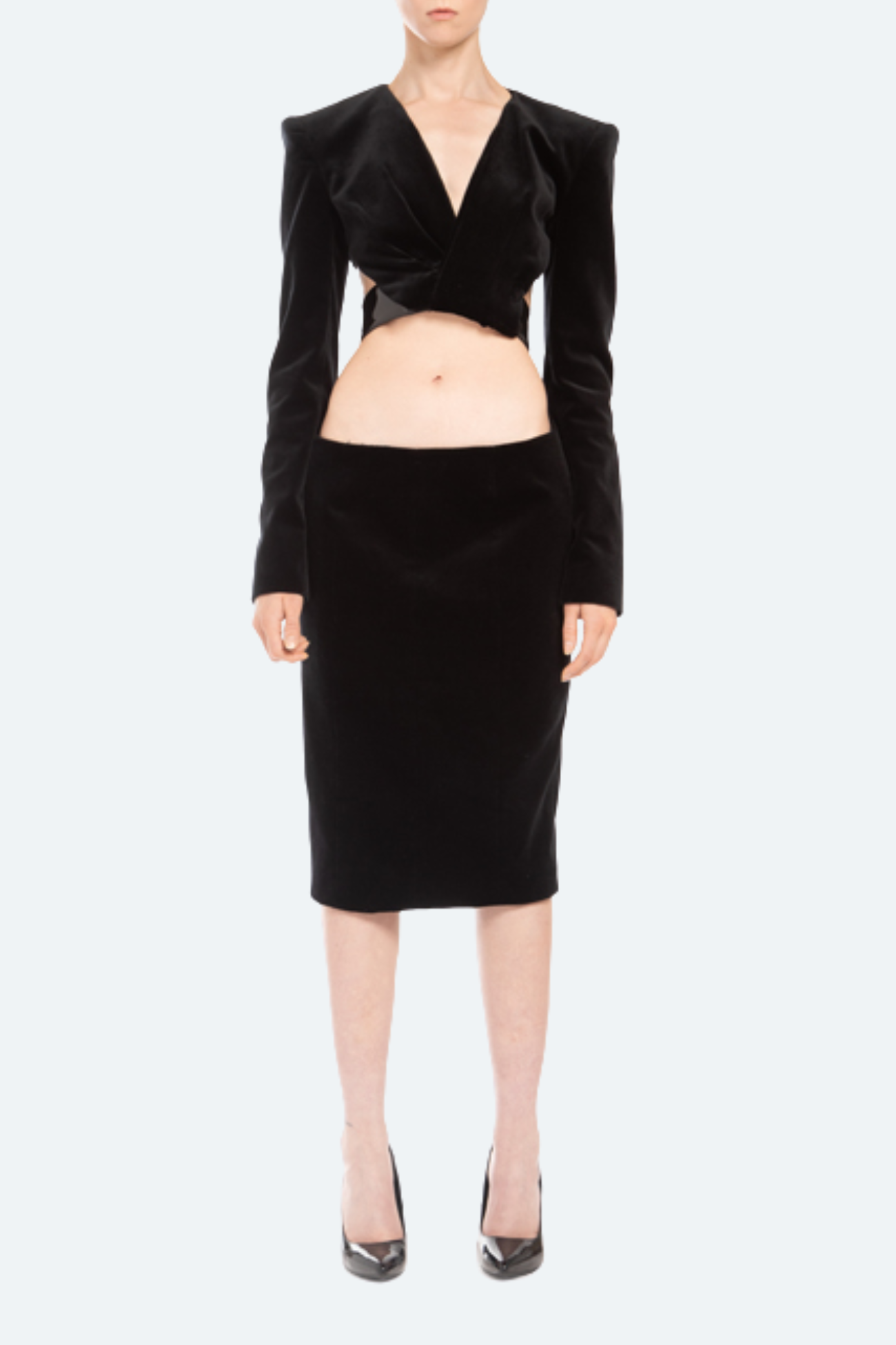 Front view black velvet cutout dress with cropped blazer top and patent leather wraparound belt