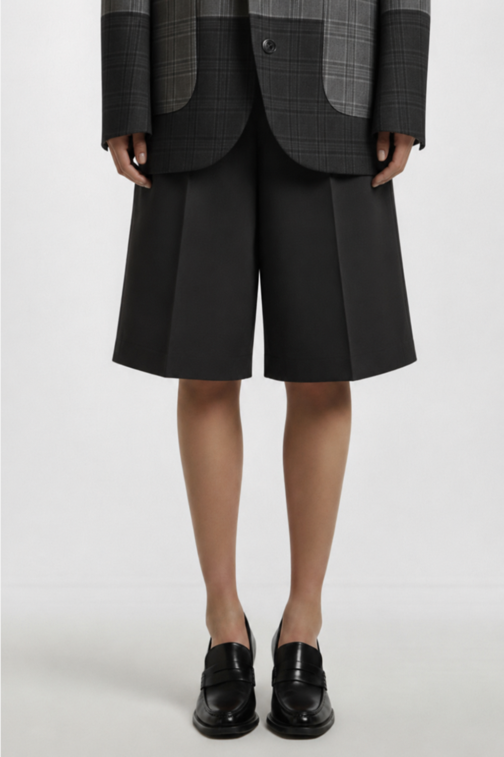 Black wool Bermuda shorts front view