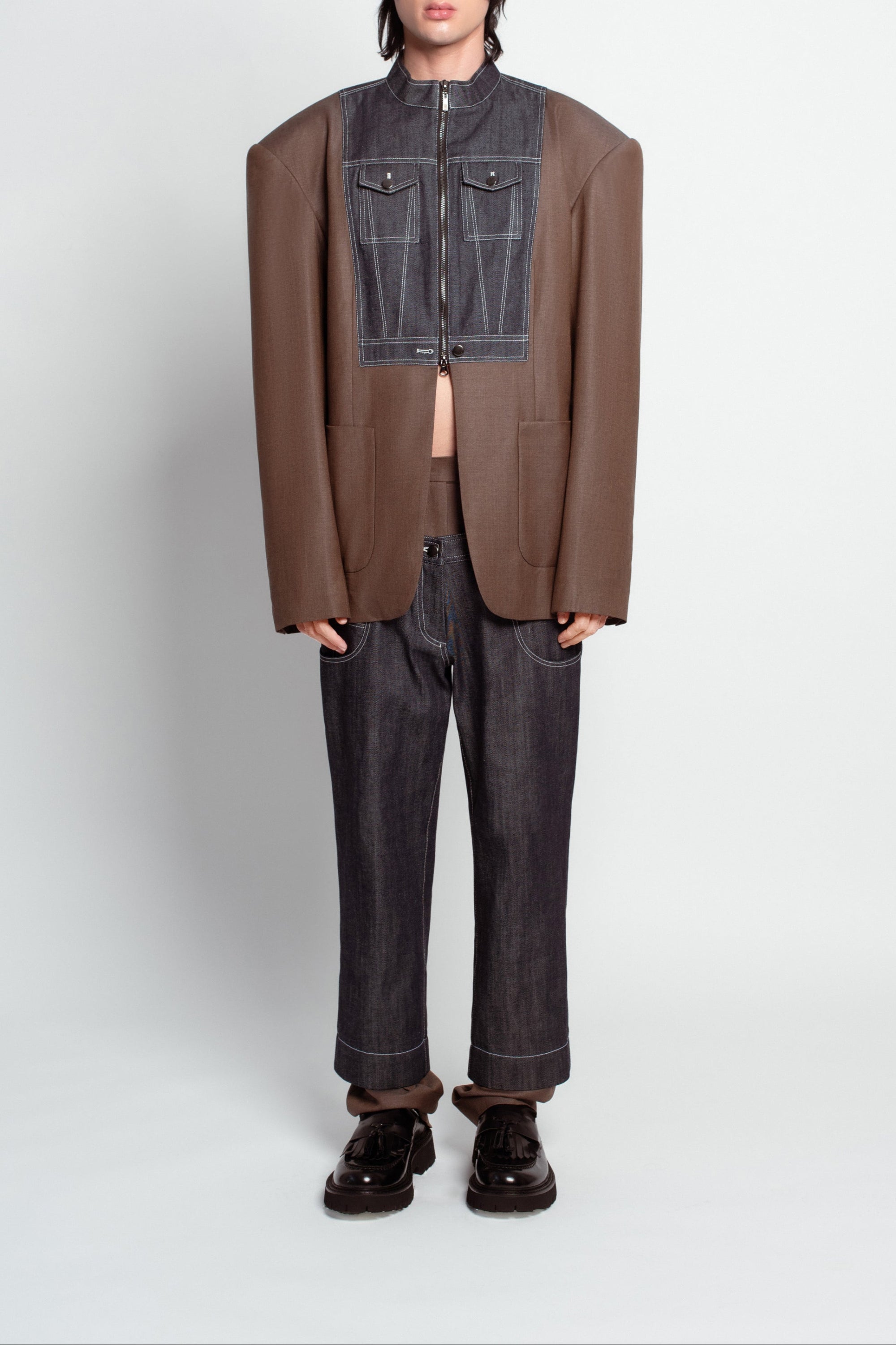 Blue denim dual-layer trousers with warm brown base front view