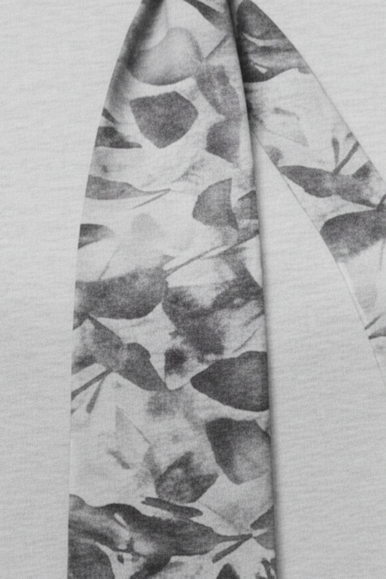 SHAO grey oversized shirt with trompe l’oeil floral tie graphic detail