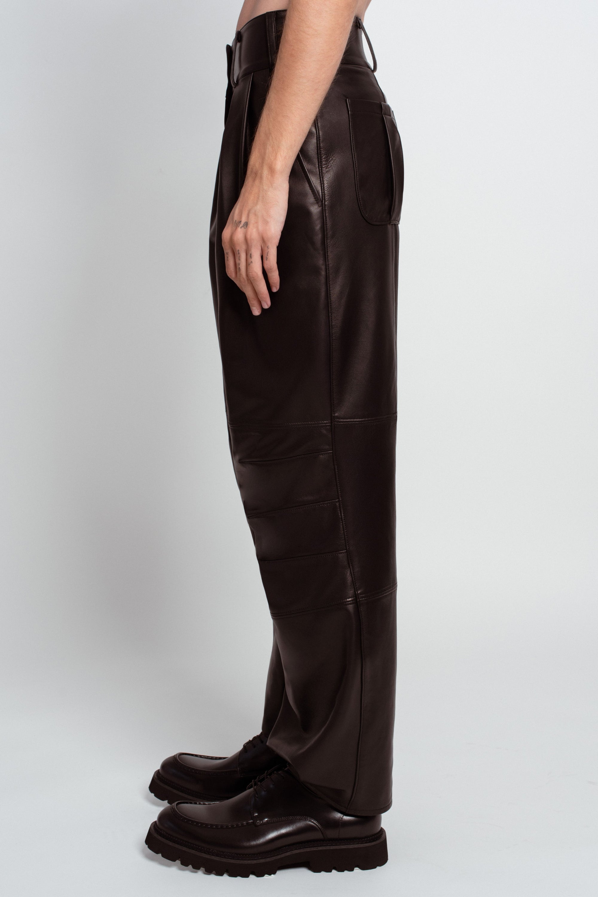 Black leather pleated wide-leg trousers side view
