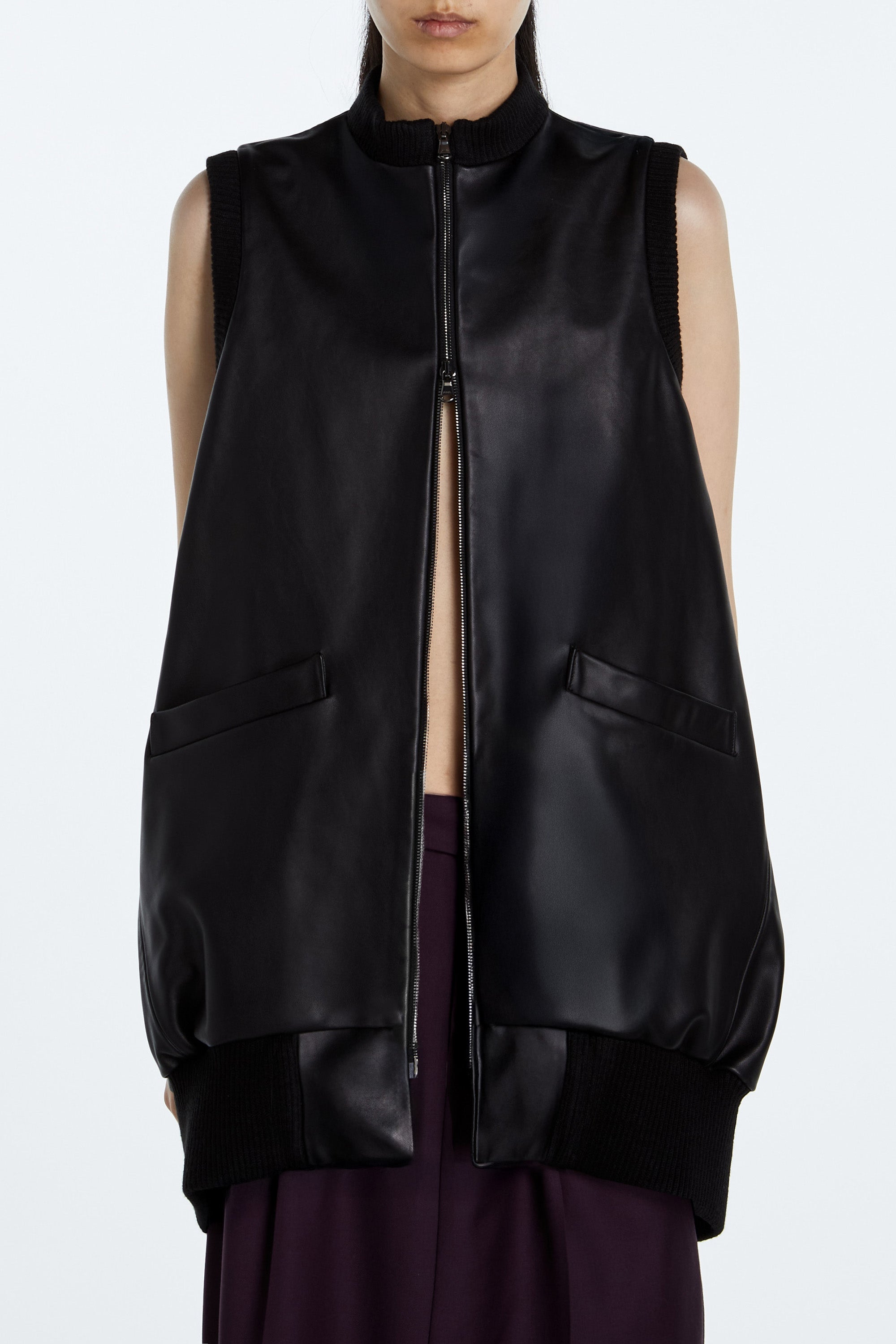 SHAO jet black leather cocoon bomber vest layered styling detail