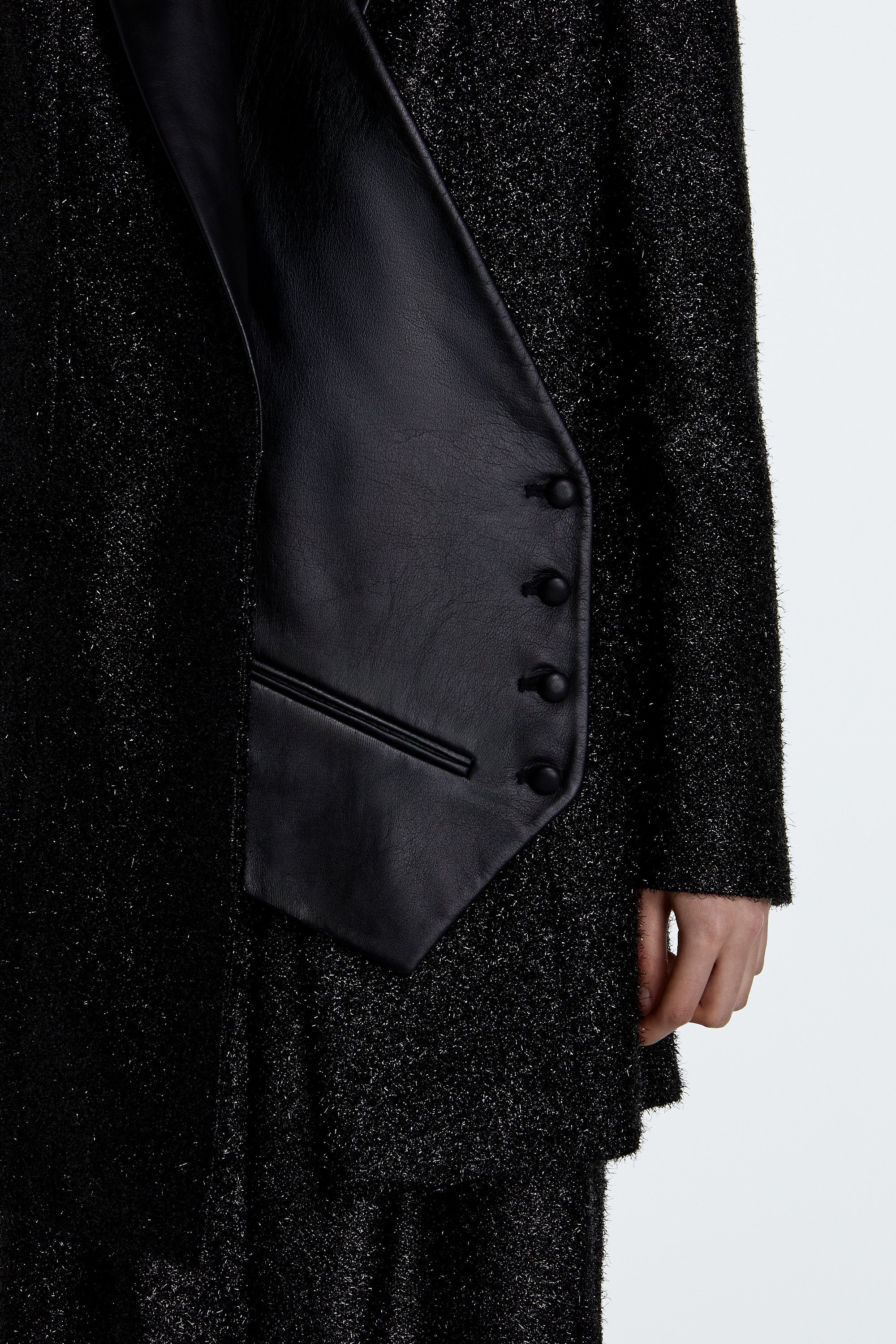 SHAO jet black sparkle suit jacket with leather vest layering detail