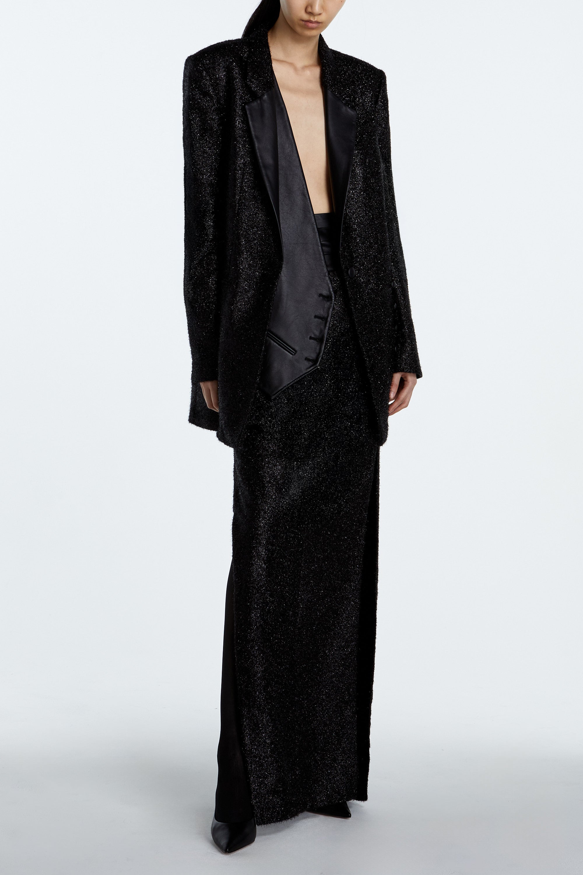 SHAO jet black sparkle suit jacket with layered asymmetrical leather vest side view