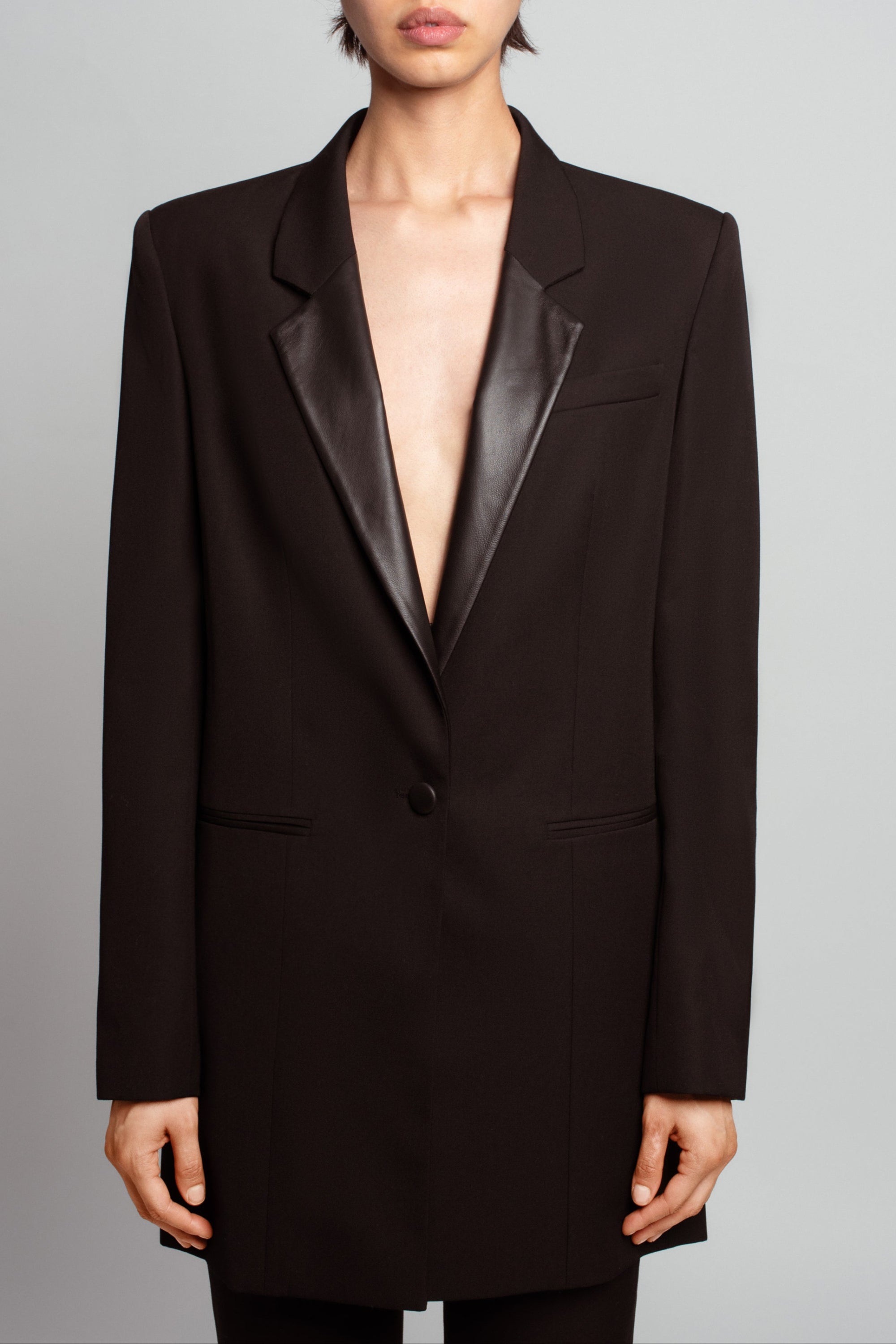 SHAO jet black wool long jacket with leather lapels front view
