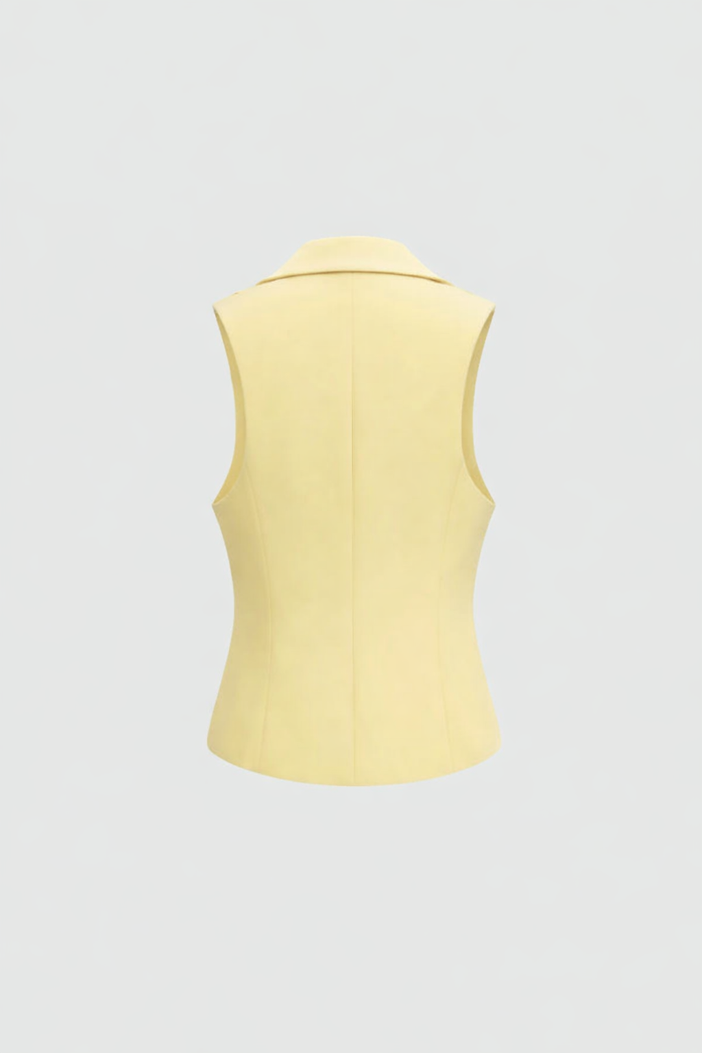 Yellow sleeveless top on a light gray background