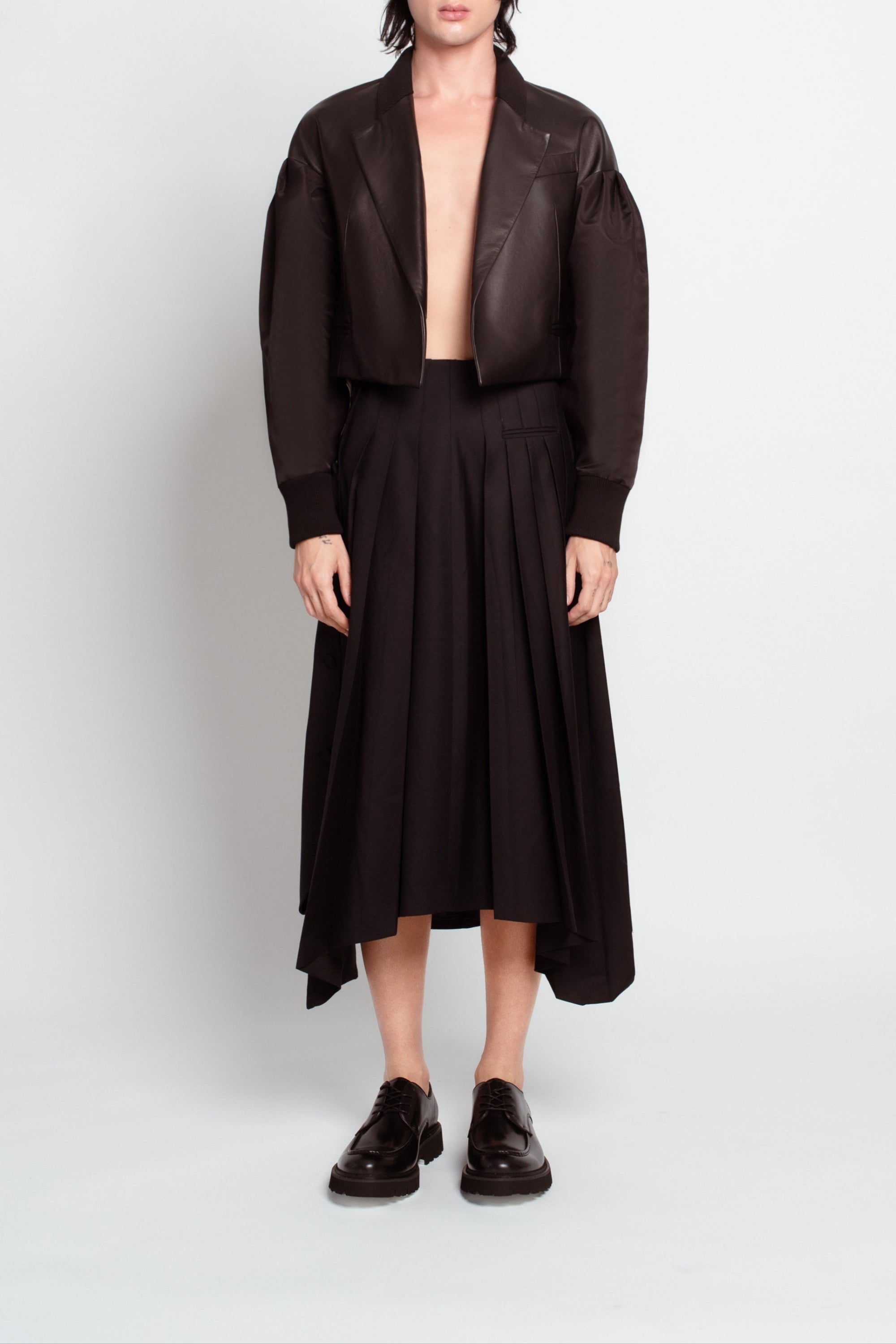 Front view of Jet Black Leather Bomber Jacket – Cropped Boxy Silhouette featuring a structured collar, voluminous sleeves, and sleek tailored finish, embodying SHAO New York luxury designer fashion and bespoke New York tailoring.