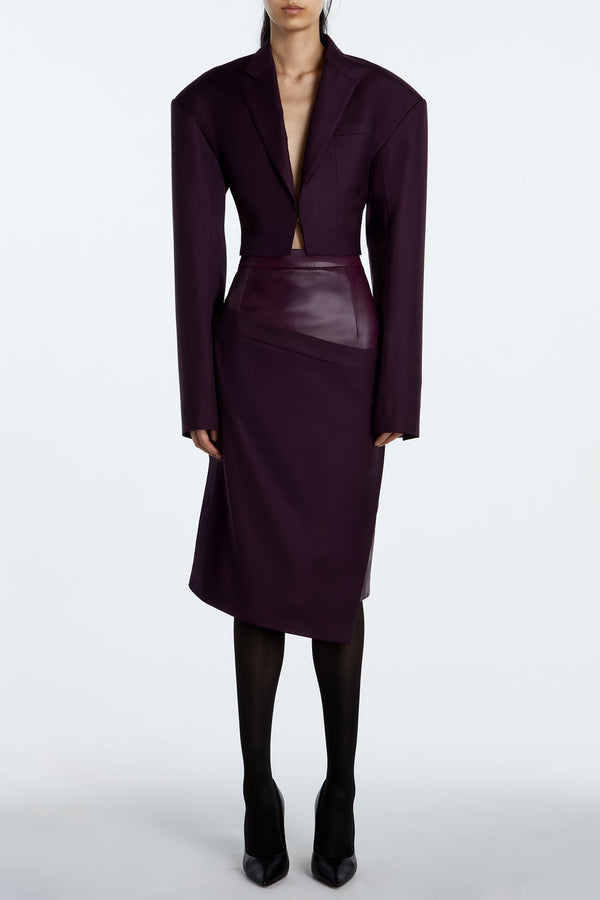 Aubergine Dual-Layer Asymmetrical Draped Skirt with leather and wool layers in rich aubergine tone.