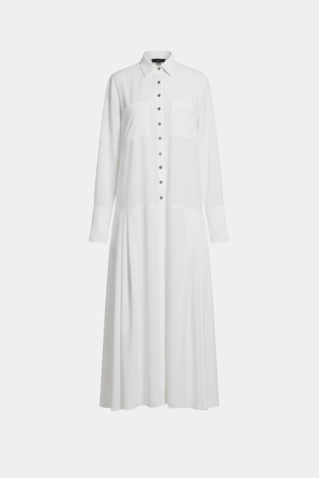 White Pleated Shirt Dress featuring a sharp collar, button-down front, long sleeves with extended cuffs, and a flowing pleated skirt, embodying SHAO New York bespoke tailoring and sculptural silhouette.